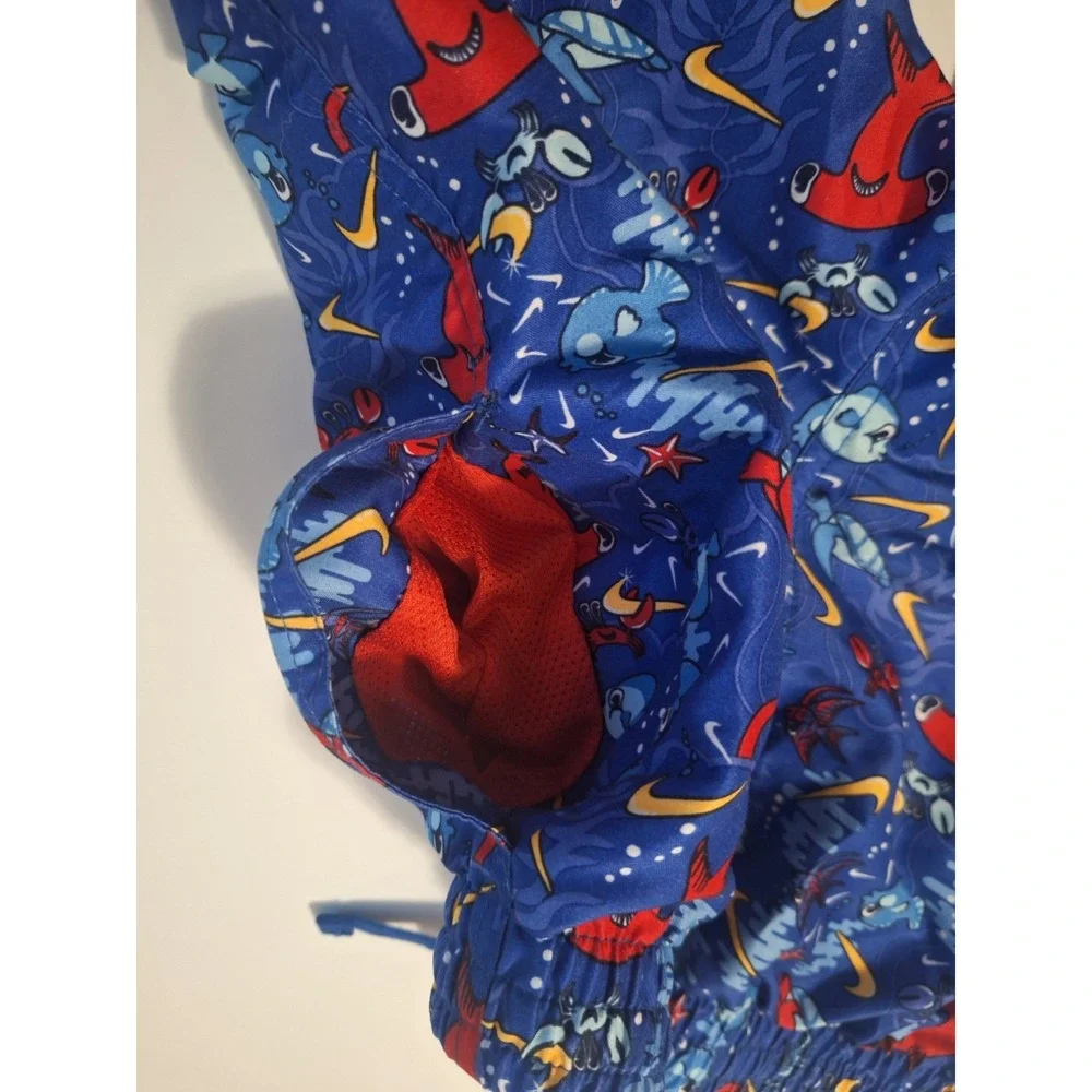 Nike Boys Medium 10-12 Swim Trunks Blue Shark Fish Print Mesh Lined Swoosh